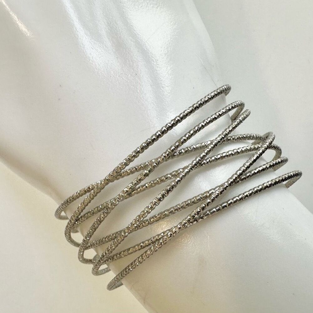 Silver tone open cuff bracelet